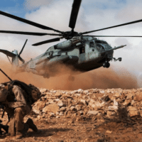 US Marines wait to be extracted by helicopter during a military exercise in Cap Draa, Morocco, April 16, 2012. Photo courtesy Defense Imagery/Wikimedia Commons.